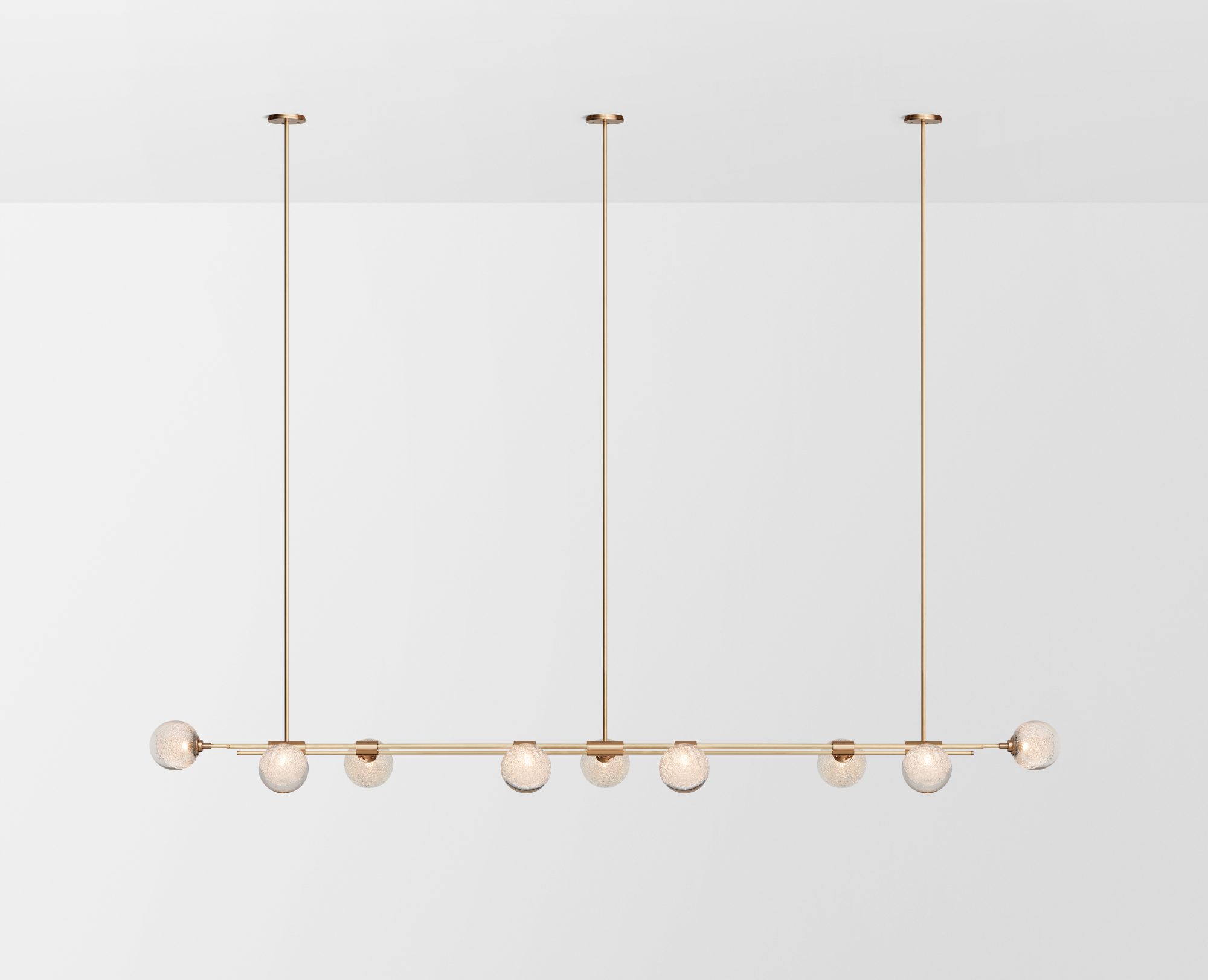 Articolo Studios Luxury Lighting. Trilogy Horizontal 9 Ball pendant in brass