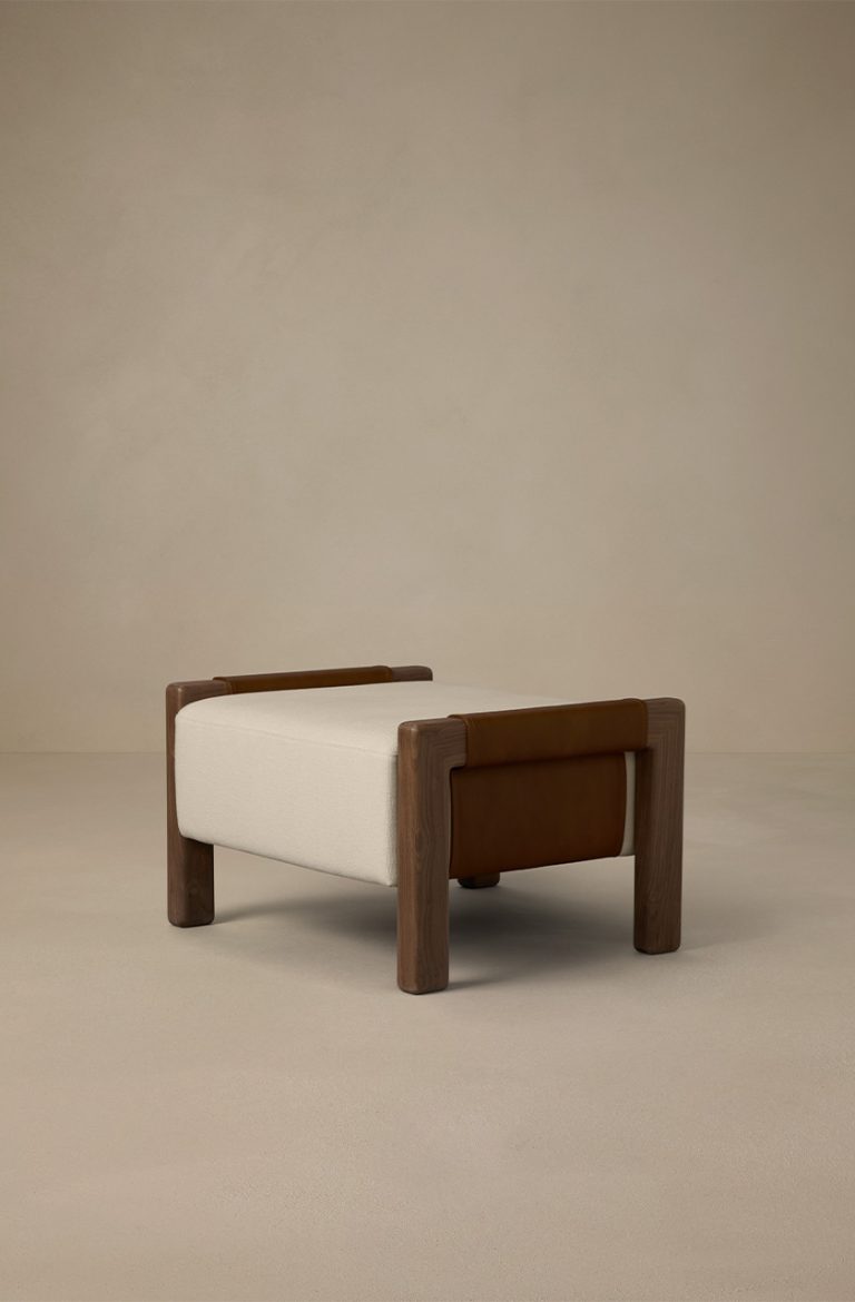 Articolo Studios luxury lighting. Saddle ottoman in driftwood leather with walnut and bone linen details