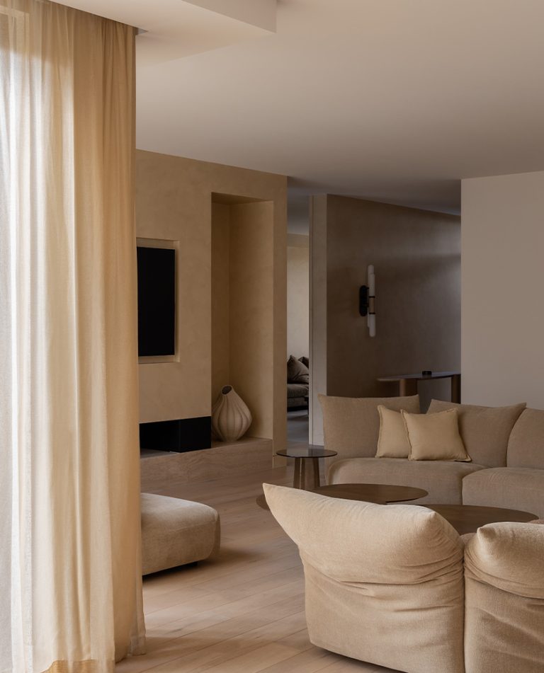 Articolo Studios Luxury Lighting Scandal Wall Sconce in the Living Room of House Caramel by CHJ Studio